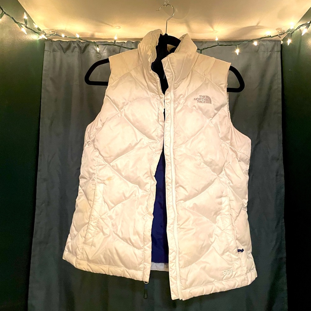 North face puffy white vest with navy blue inter